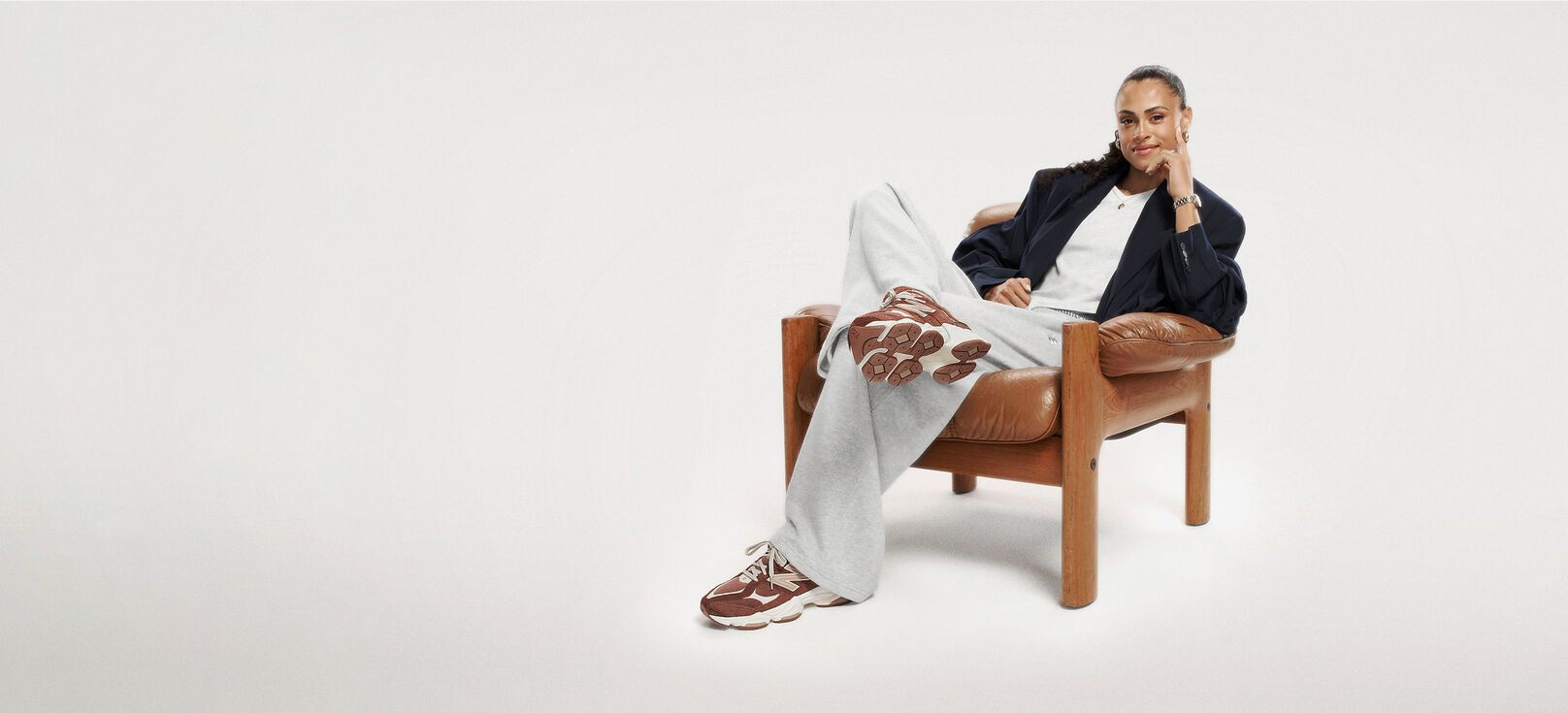 Sydney Mclaughlin sitting on a chair 